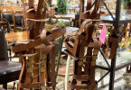 metal sculptures of figures playing instruments