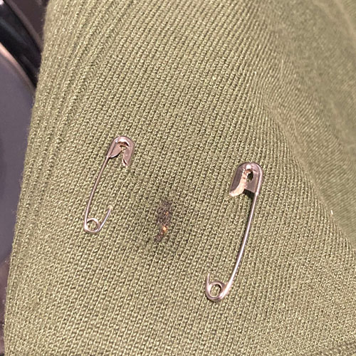 sweater needing stain removal