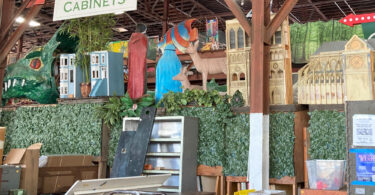 thrift store with green and arty decor