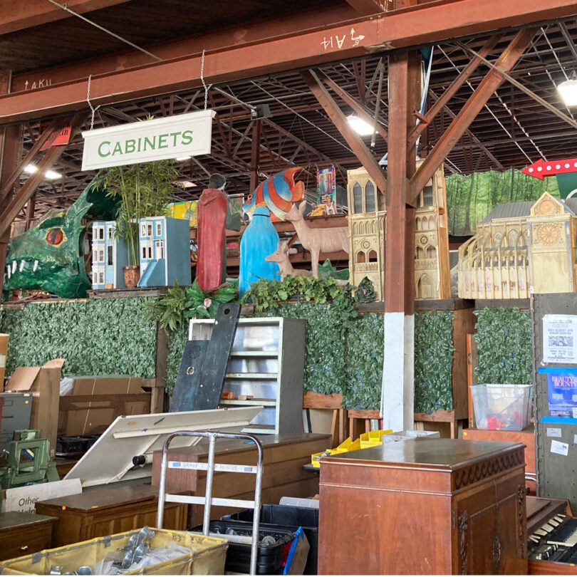 thrift store with green and arty decor