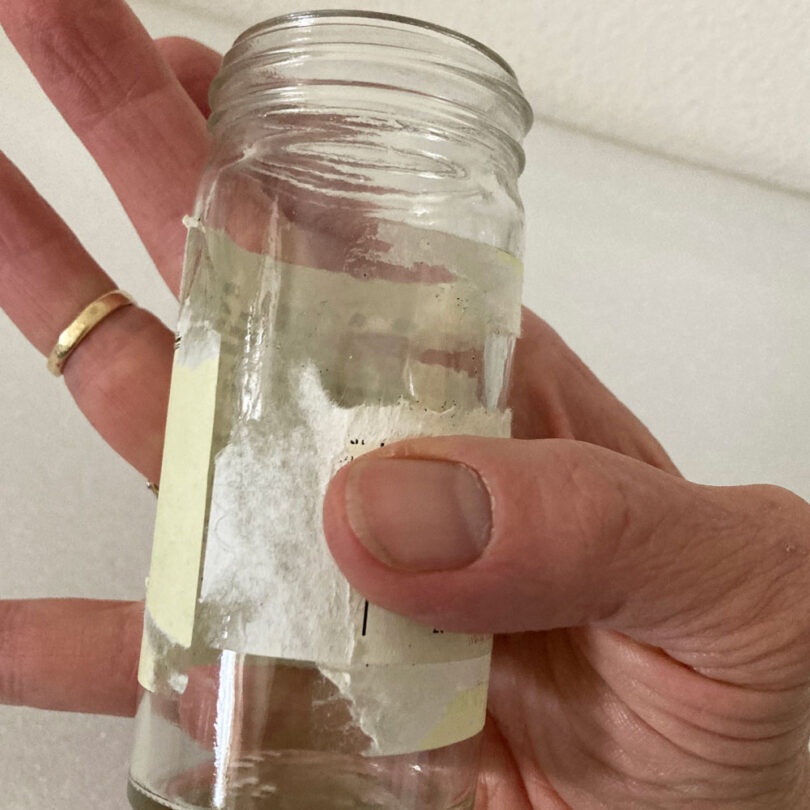 how to remove sticky residue from surfaces of this jar