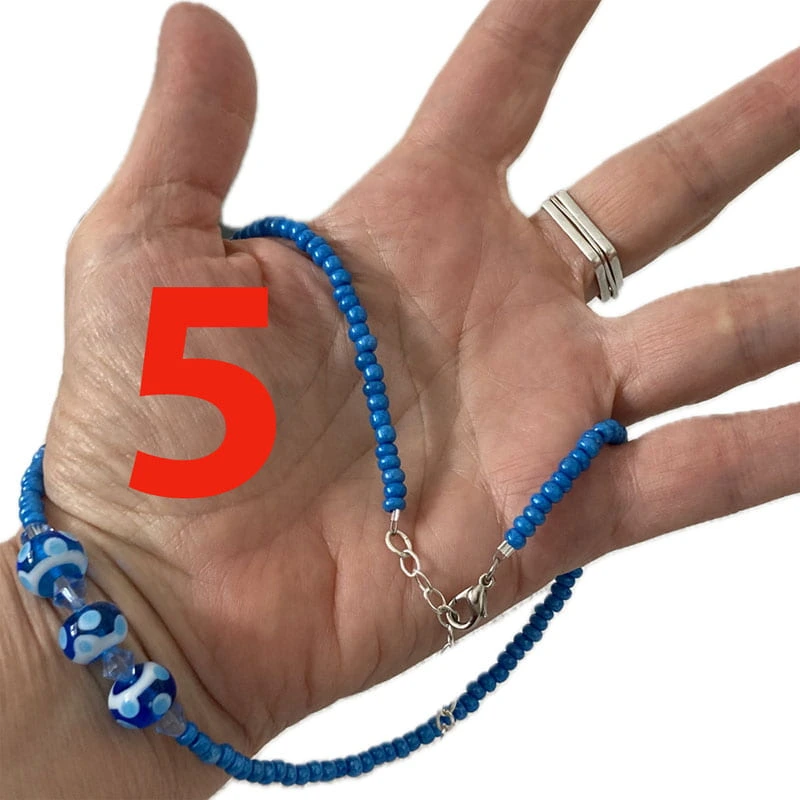five essential beading tools necklace in hand