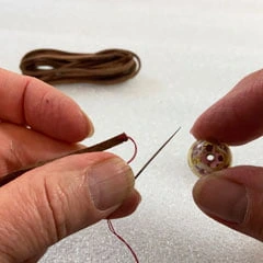sliding knot adjustable necklace thread and needle to string focal bead