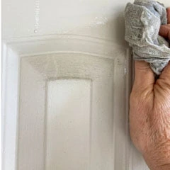 painting your front door washing the filthy door